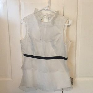 White ruffle top. New with tags.